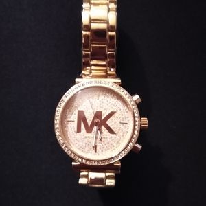woman's rose gold watch